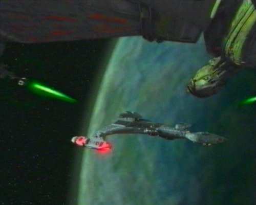 K'Vort class ship attacking a Vor'Cha during the Klingon civil war in the 2367